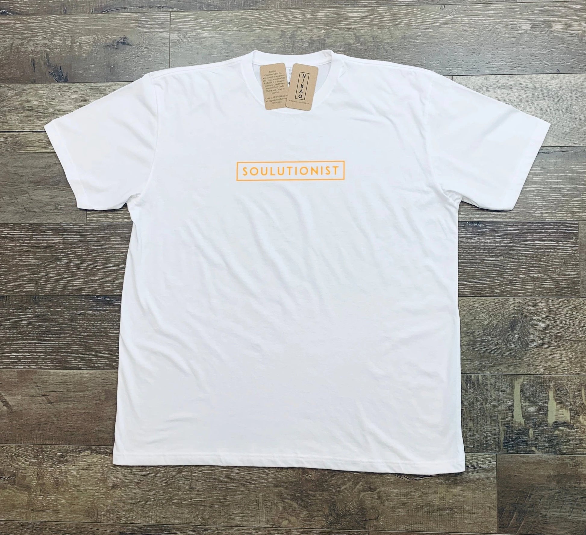 Soulutionist Tee Christian Shirts, lay flat white